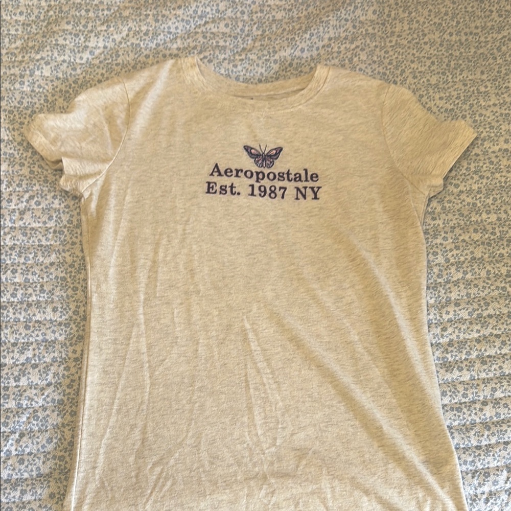 Aeropostale Cream Tee with Purple Butterfly Design